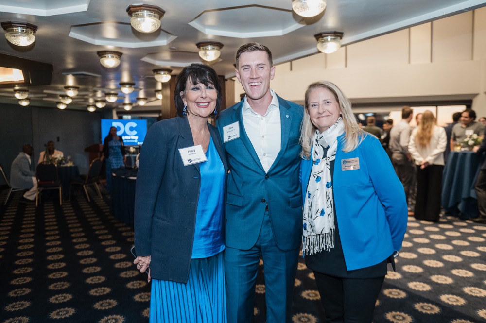President Mantella poses with man and woman